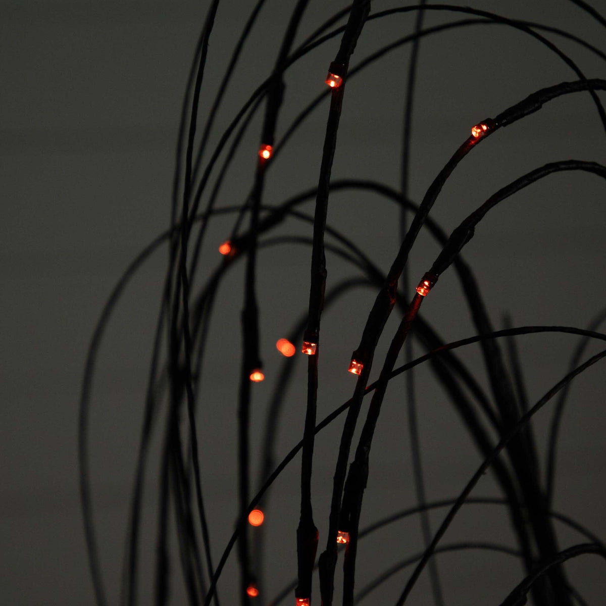 4 ft Halloween Black Willow tree with orange LED lights along twisted black branches on Tampa Home & Garden Store