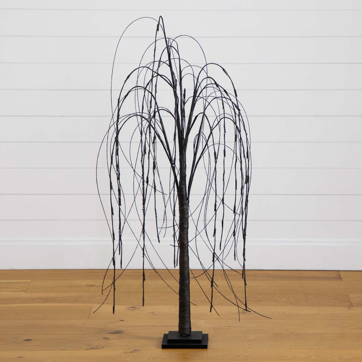 Nearly Natural 4 ft Pre-Lit Halloween Black Willow Tree with orange and purple LED lights on Tampa Home & Garden Store