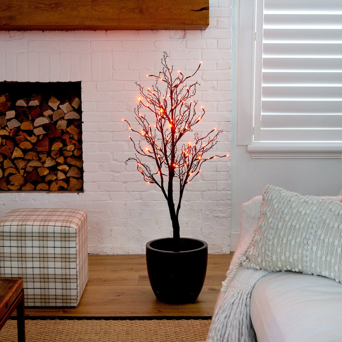 4ft Nearly Natural Black Twig Pre-Lit Halloween Tree with 81 orange and purple LEDs in pot on Tampa Home & Garden Store