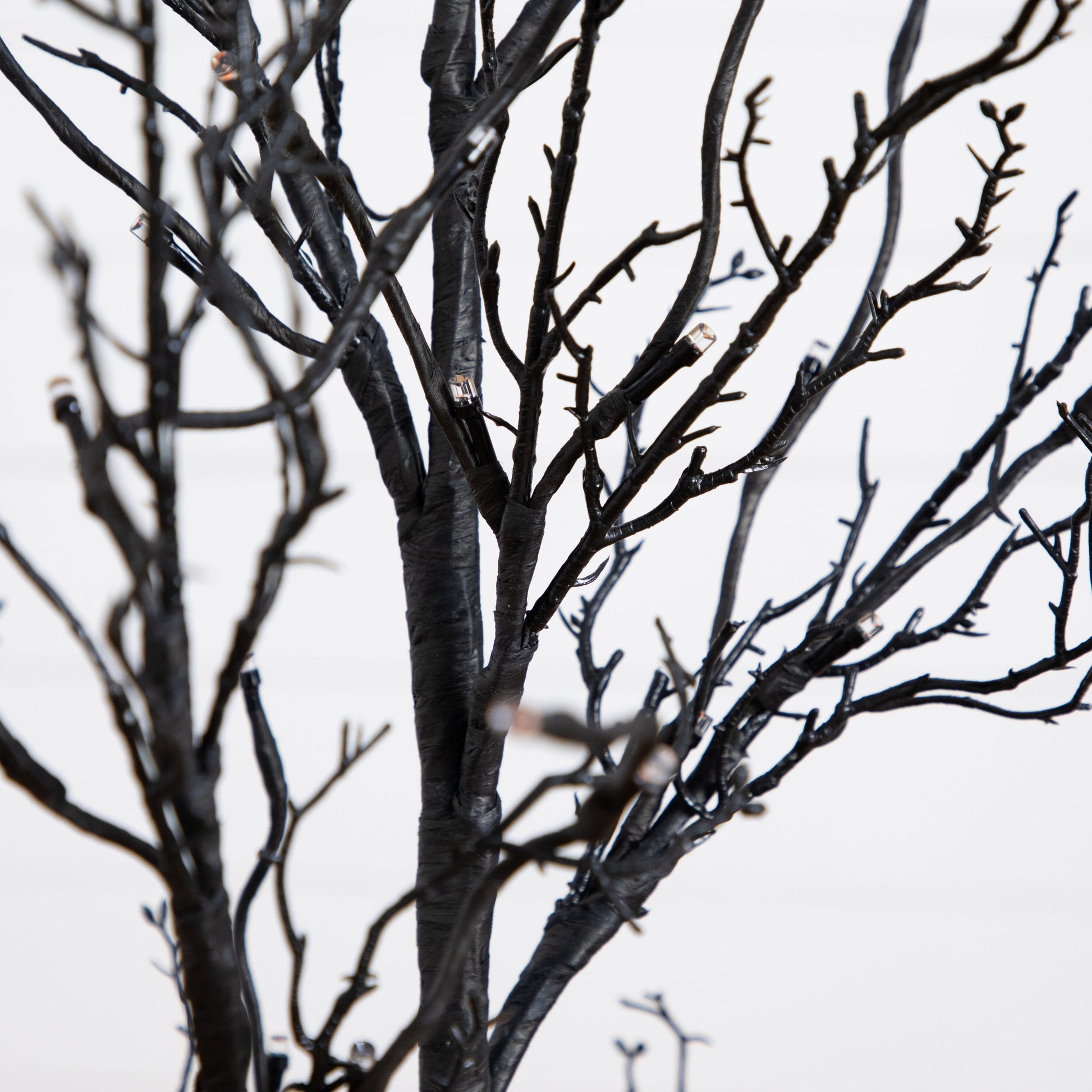 Nearly Natural 4’ pre-lit black twig Halloween tree with 81 orange & purple LEDs on Tampa Home & Garden Store