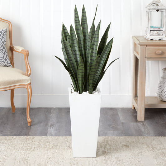 4’ Sansevieria artificial plant in a white tower planter with white decorative stones on Tampa Home & Garden Store