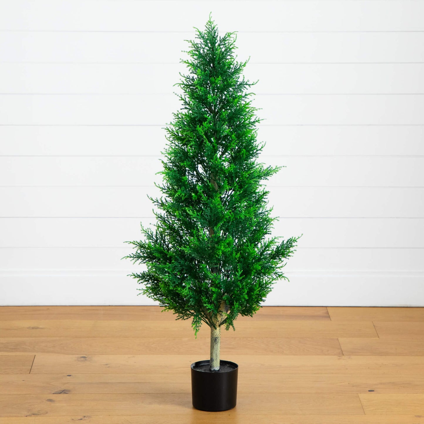 4ft UV-resistant Cypress Tower Tree Nearly Natural green indoor outdoor use on Tampa Home & Garden Store