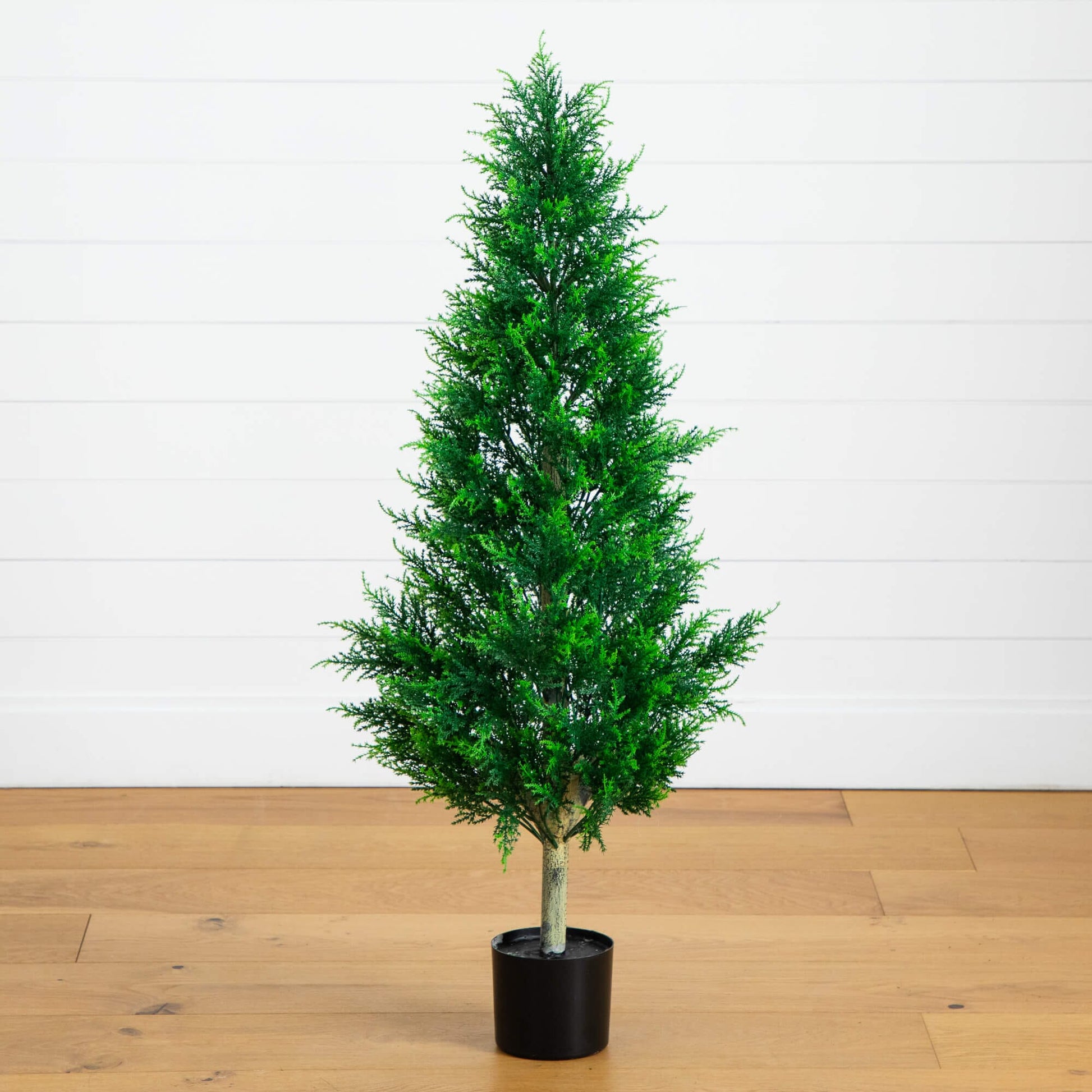 4ft UV-resistant Cypress Tower Tree Nearly Natural green indoor outdoor use on Tampa Home & Garden Store