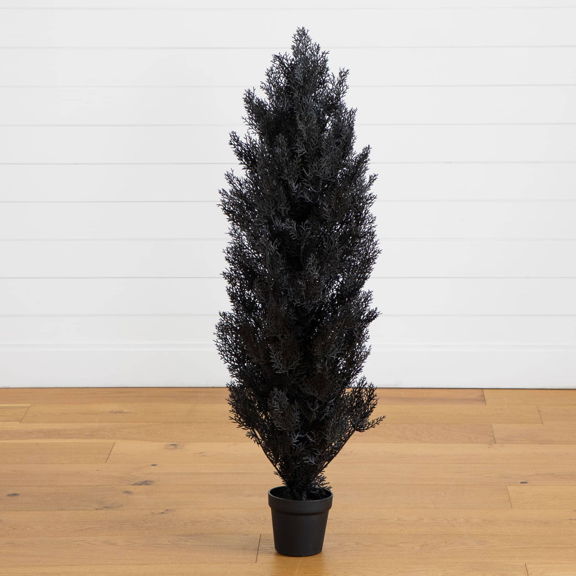 4 ft UV resistant black cedar artificial tree in black pot Nearly Natural for outdoor use on Tampa Home & Garden Store