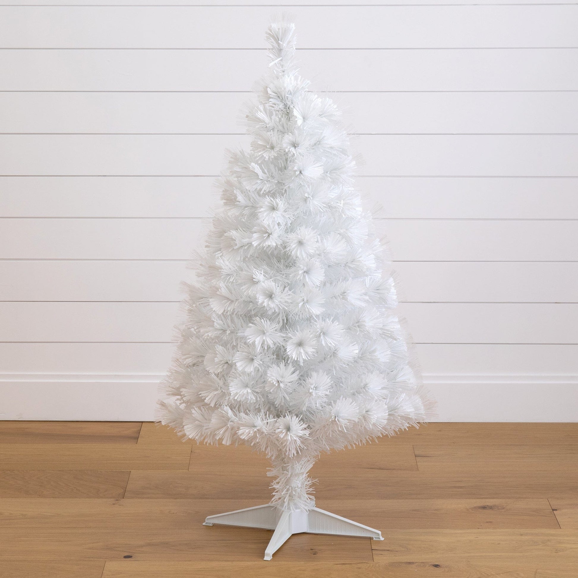 Nearly Natural 4 ft white fiber-optic Christmas tree with LED lights on white plastic stand on Tampa Home & Garden Store