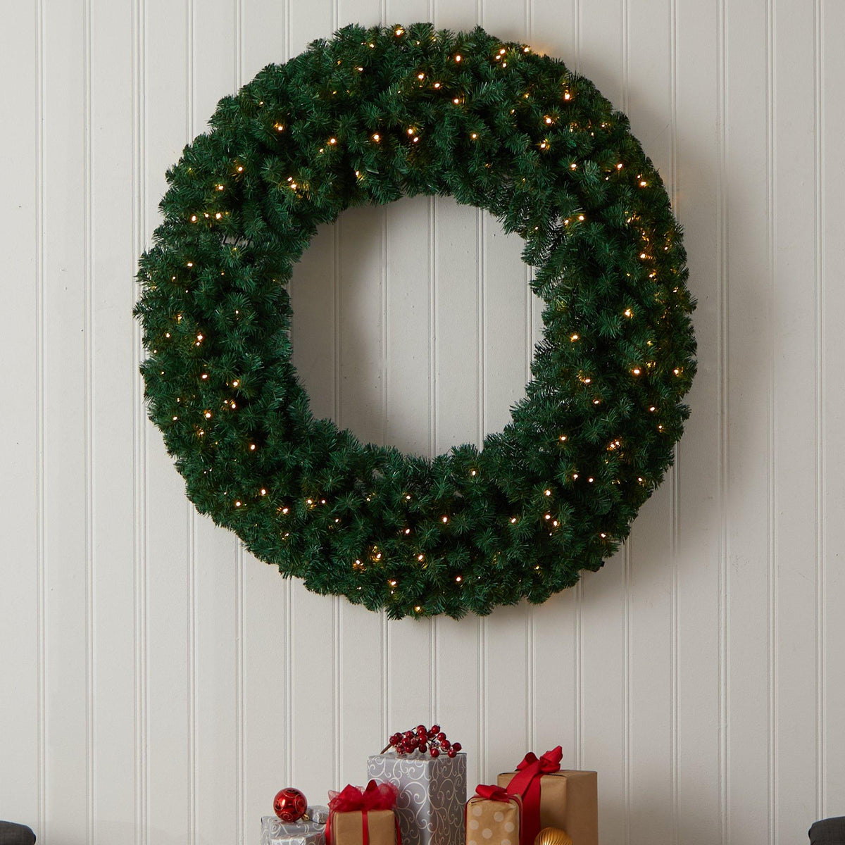 48in artificial Christmas wreath with 714 bendable branches and 200 warm white LEDs on Tampa Home & Garden Store