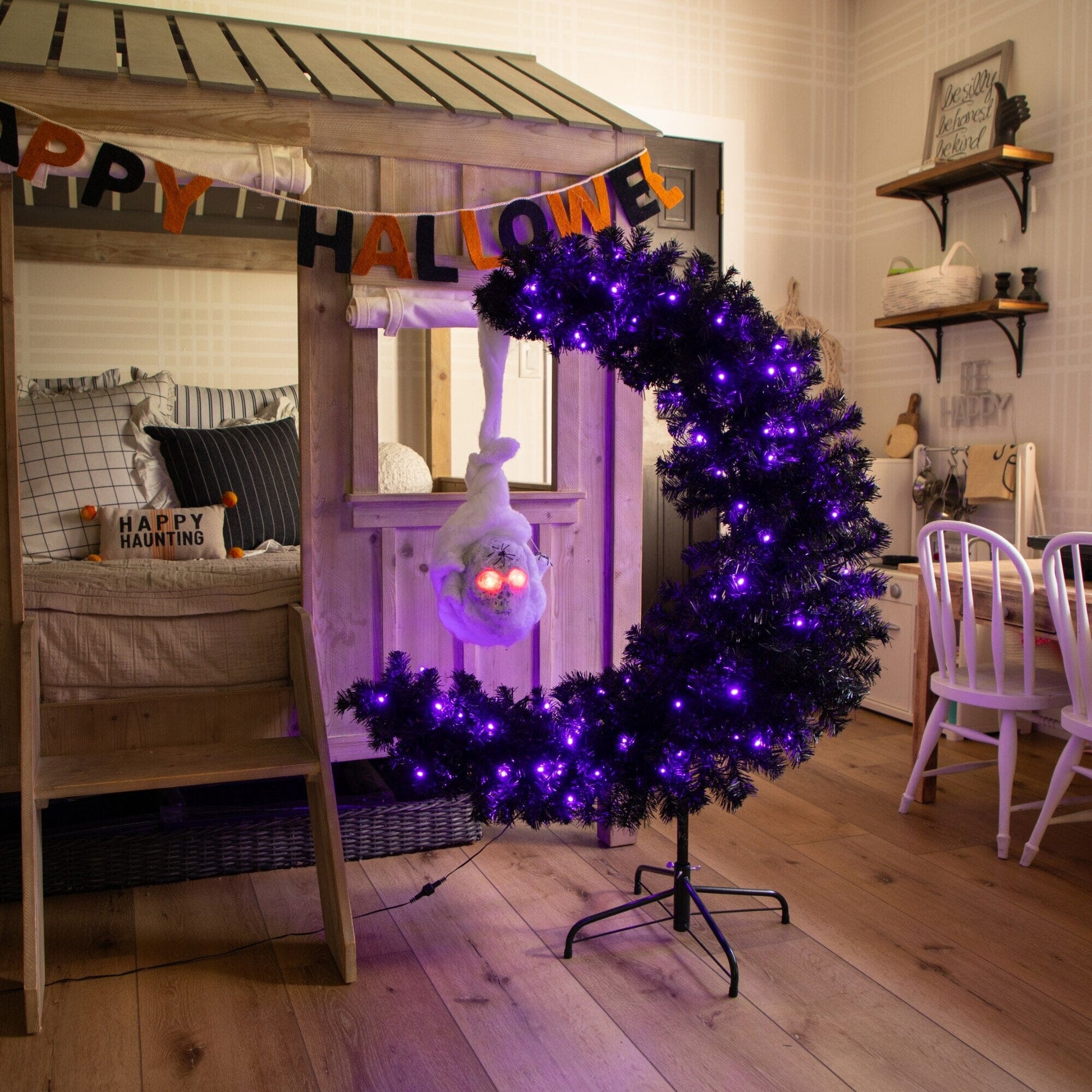 4ft pre-lit artificial Halloween tree with moon skull accents and 250 orange/purple LEDs on Tampa Home & Garden Store