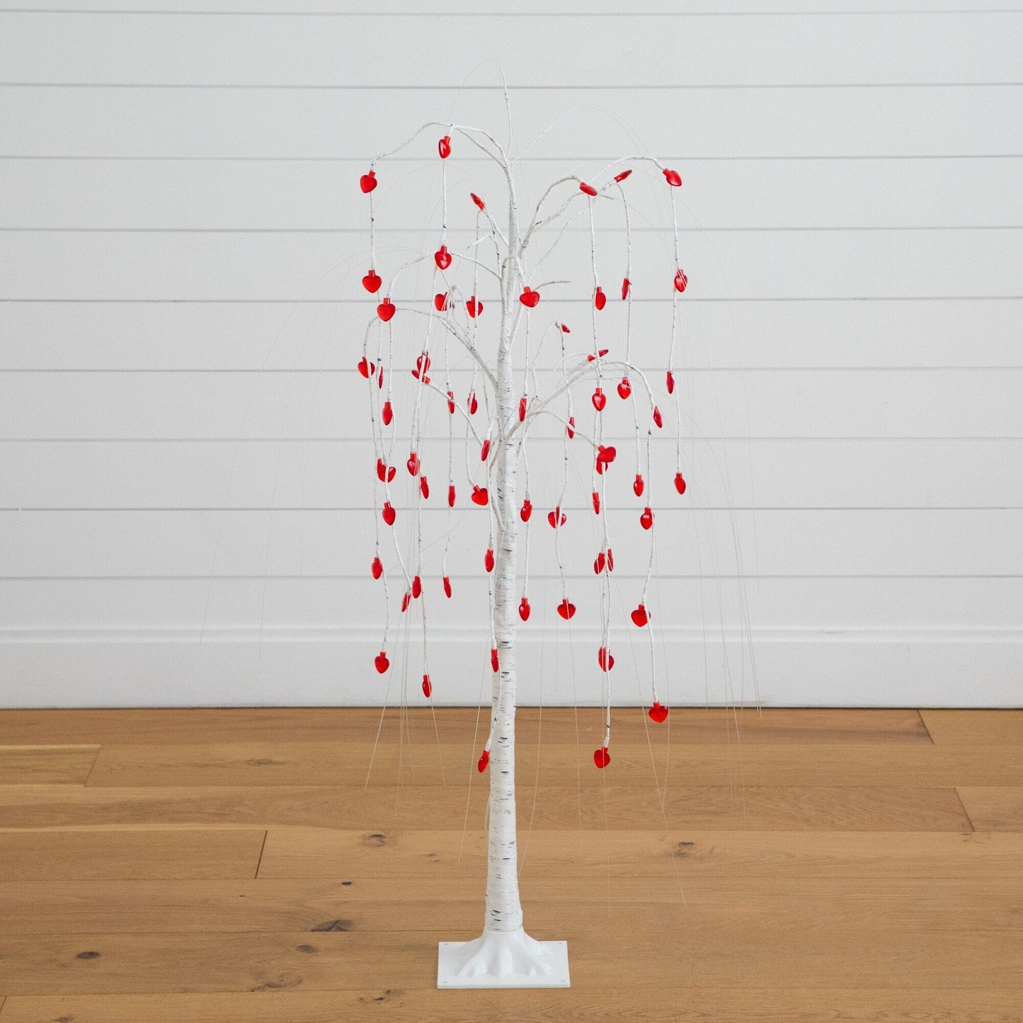 4 ft Nearly Natural willow tree with 48 red heart LED lights on white trunk and base on floor on Tampa Home & Garden Store