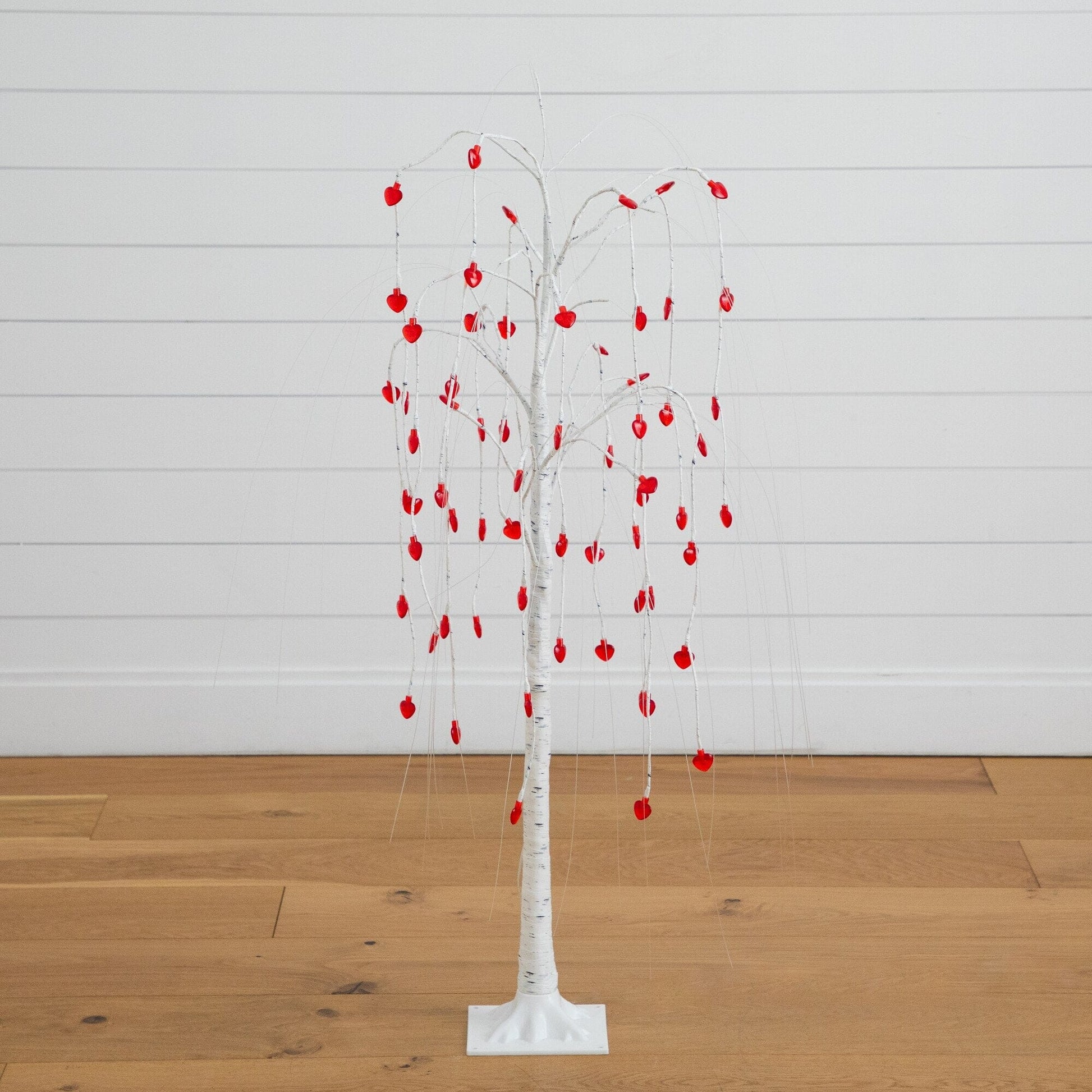 4 ft Nearly Natural willow tree with 48 red heart LED lights on white trunk and base on floor on Tampa Home & Garden Store