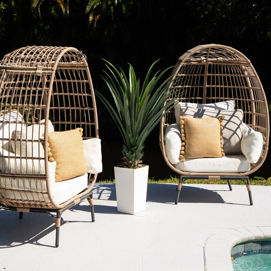 4' UV resistant artificial spiked agave plant in white tower planter between wicker chairs on Tampa Home & Garden Store