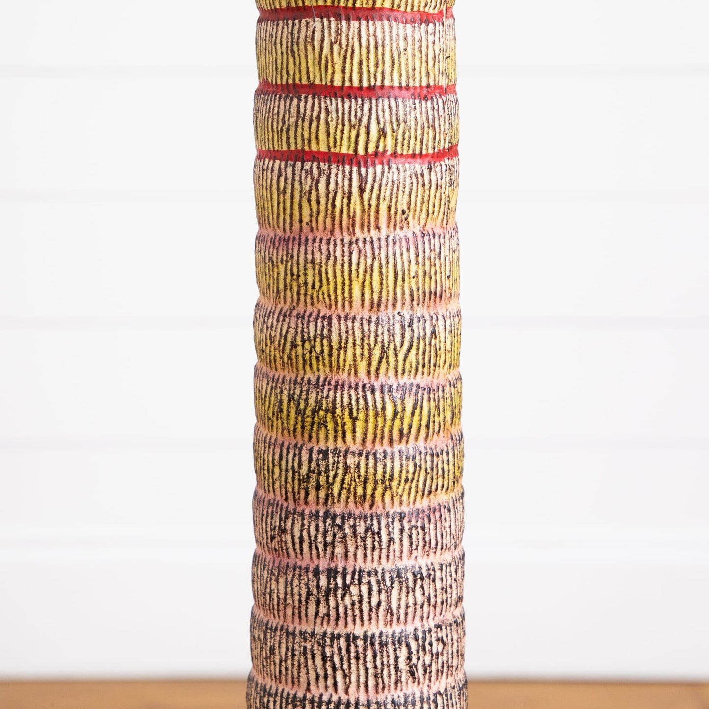 5’ Artificial Coconut Palm Tree trunk close-up with beige-brown rings and red bands Nearly Natural on Tampa Home & Garden Store