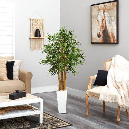 5’ bamboo tree in a white tower planter with green foliage in a modern living room on Tampa Home & Garden Store