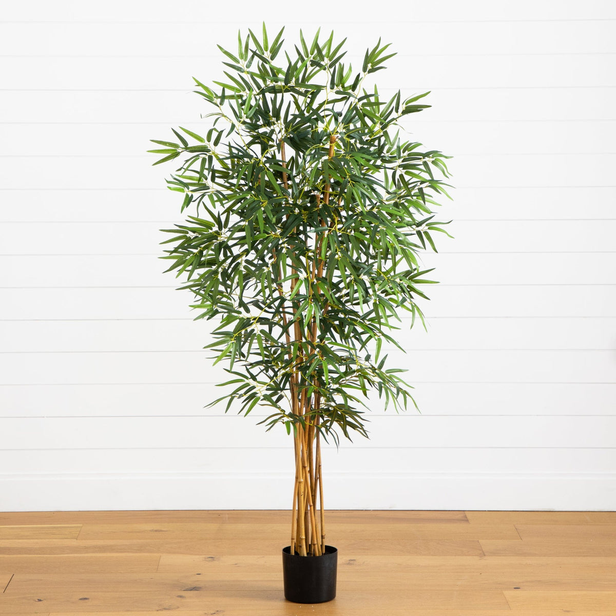 5' Fancy Style Bamboo Silk Tree by Nearly Natural in a black pot with leaves on wood floor on Tampa Home & Garden Store