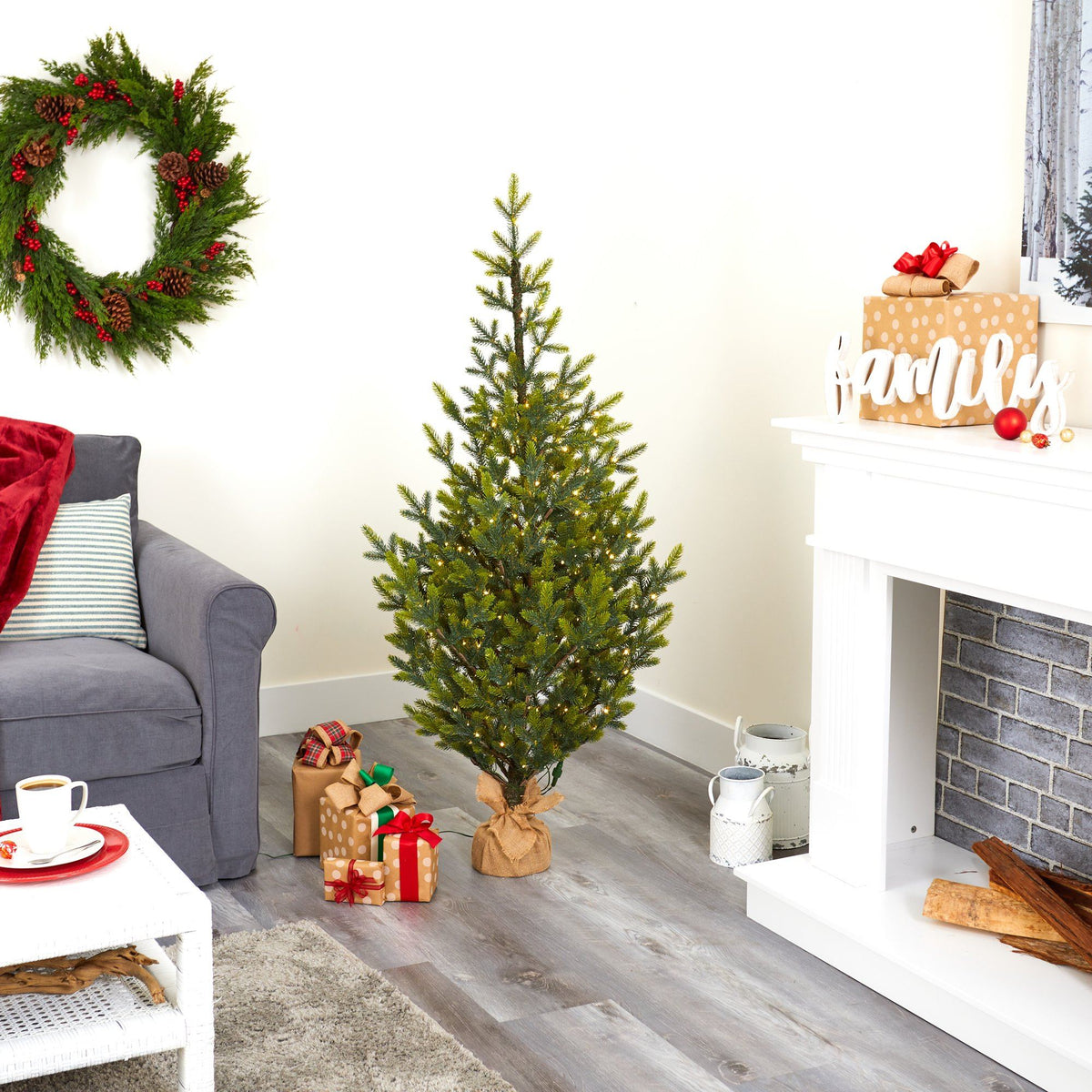 5 ft Fraser Fir Natural Look artificial Christmas tree with 200 LED lights burlap base on Tampa Home & Garden Store