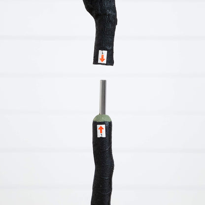 5' artificial Halloween black eucalyptus tree with textured black trunk on a metal stand on Tampa Home & Garden Store