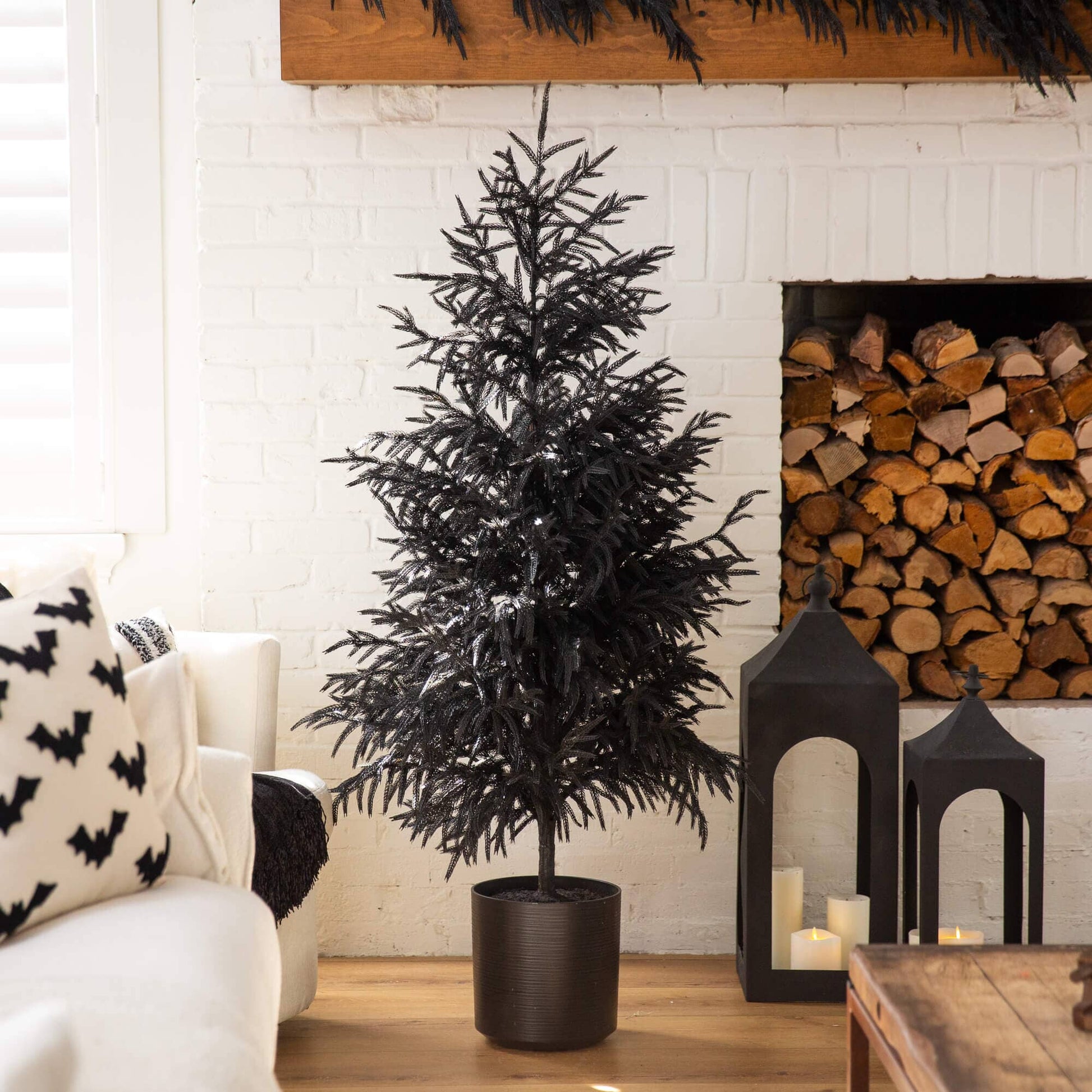 5' Black Norfolk Pine artificial Christmas tree by Nearly Natural with real touch foliage in a pot on Tampa Home & Garden Store