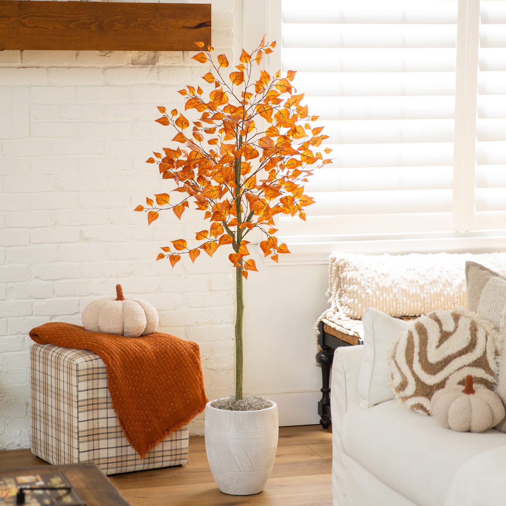 5' Nearly Natural Autumn Birch Leaf Artificial Fall Tree with orange leaves in a living room on Tampa Home & Garden Store