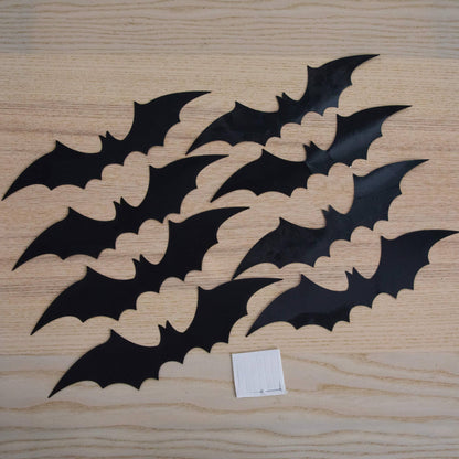 Black bat silhouette cutouts on light wood background for Halloween decor Nearly Natural on Tampa Home & Garden Store
