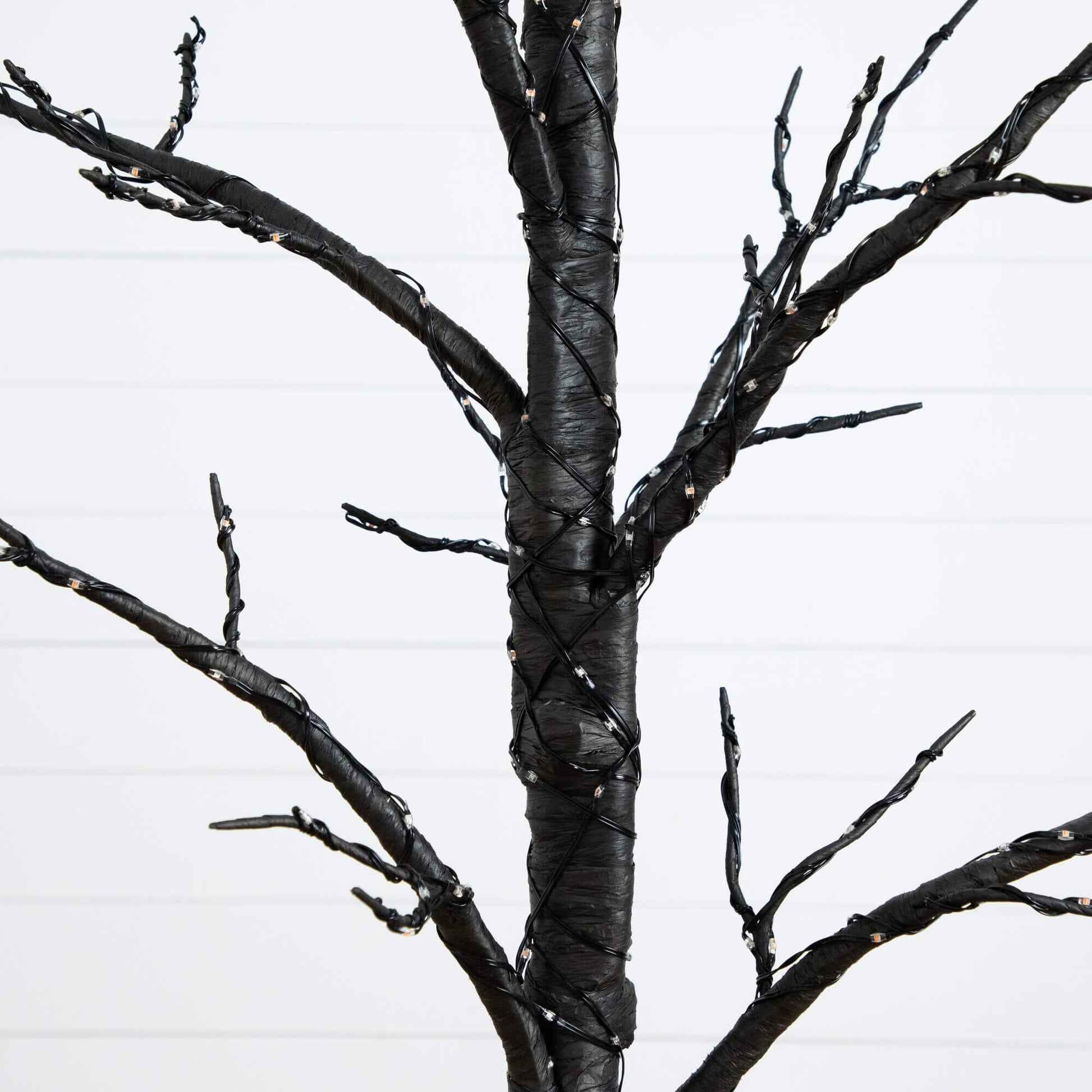 5-ft Nearly Natural pre-lit Halloween twig tree with orange and purple LEDs on Tampa Home & Garden Store