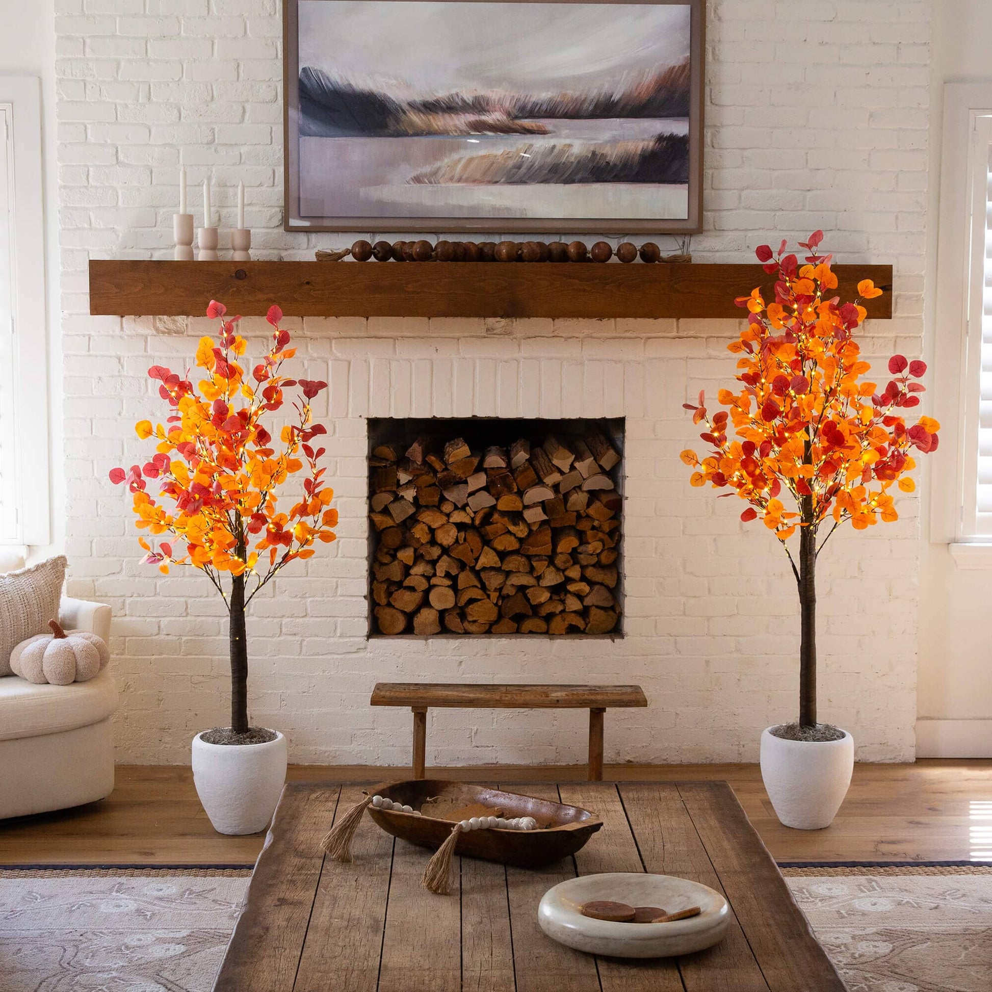 Pair of 5 ft pre-lit autumn eucalyptus artificial trees with 300 warm white LED lights on Tampa Home & Garden Store
