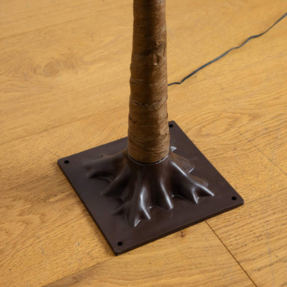 5' burnt orange maple artificial tree trunk with wrap and black base; power cord visible on Tampa Home & Garden Store