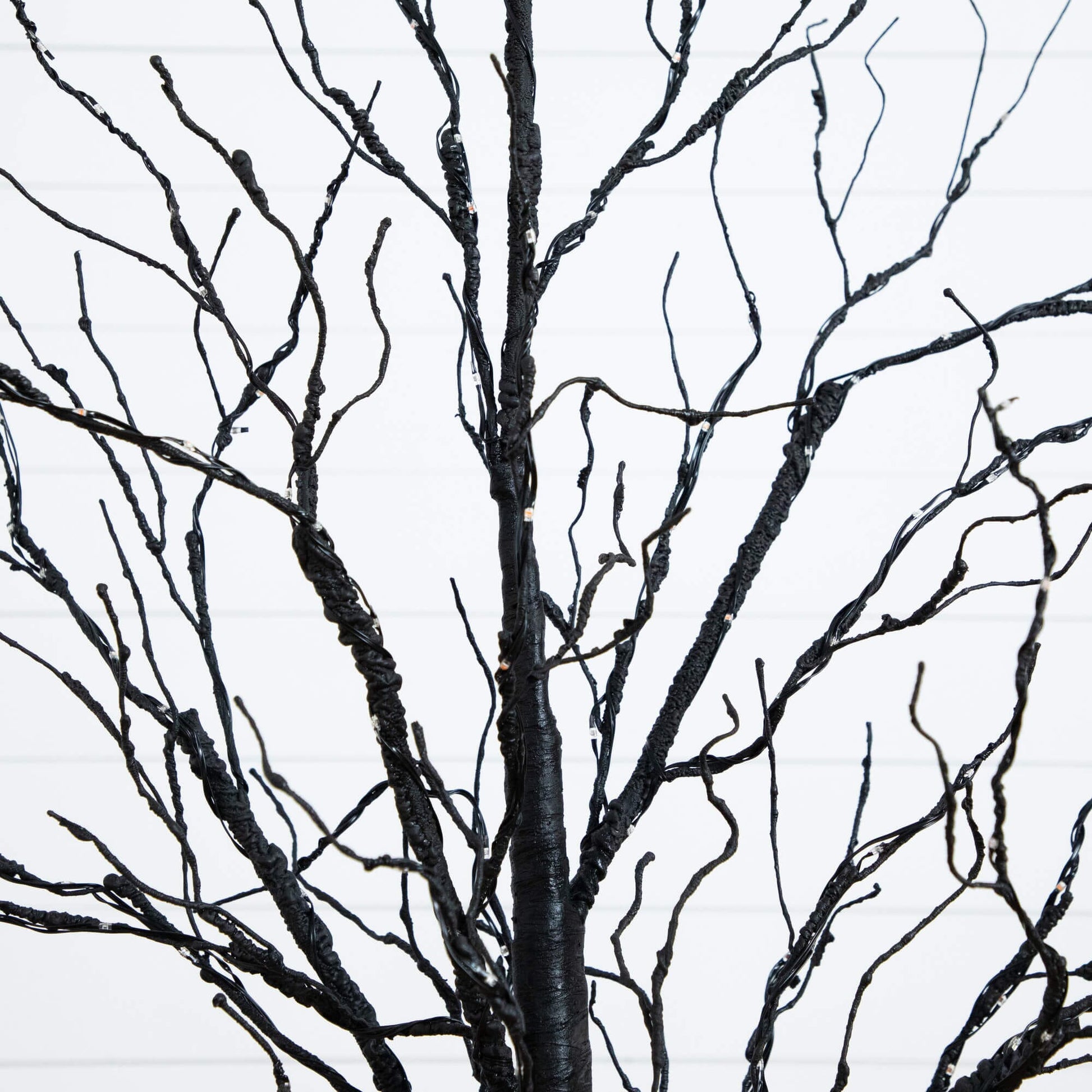 Nearly Natural 5 ft black twig Halloween tree, pre-lit with 240 orange and purple LEDs on Tampa Home & Garden Store