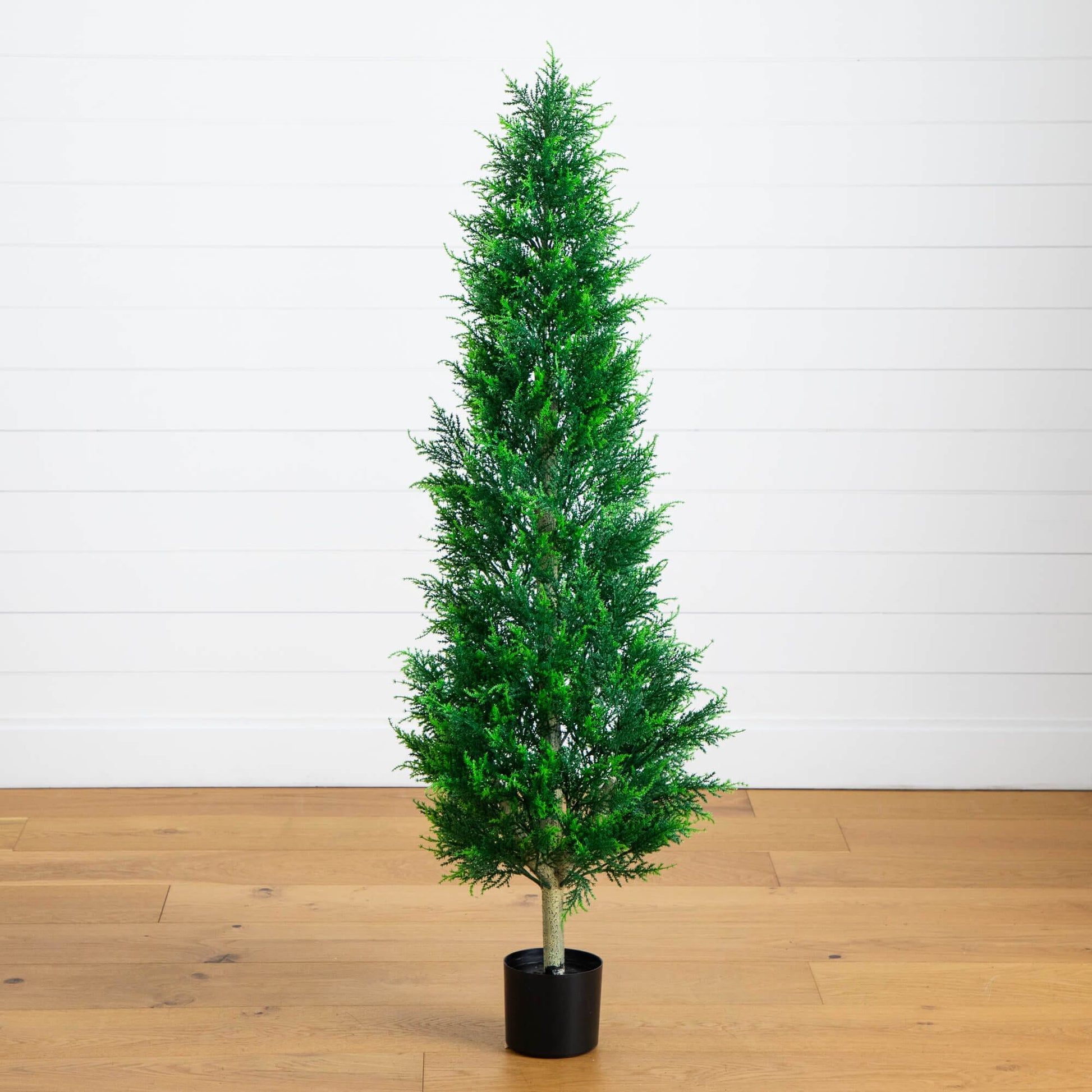 5 ft UV Resistant Artificial Cypress Tower Tree in black pot with green foliage indoors outdoors on Tampa Home & Garden Store