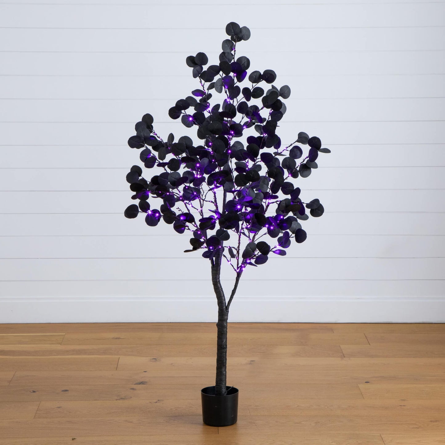 5 ft Nearly Natural pre-lit Halloween black eucalyptus tree with orange and purple LEDs on Tampa Home & Garden Store