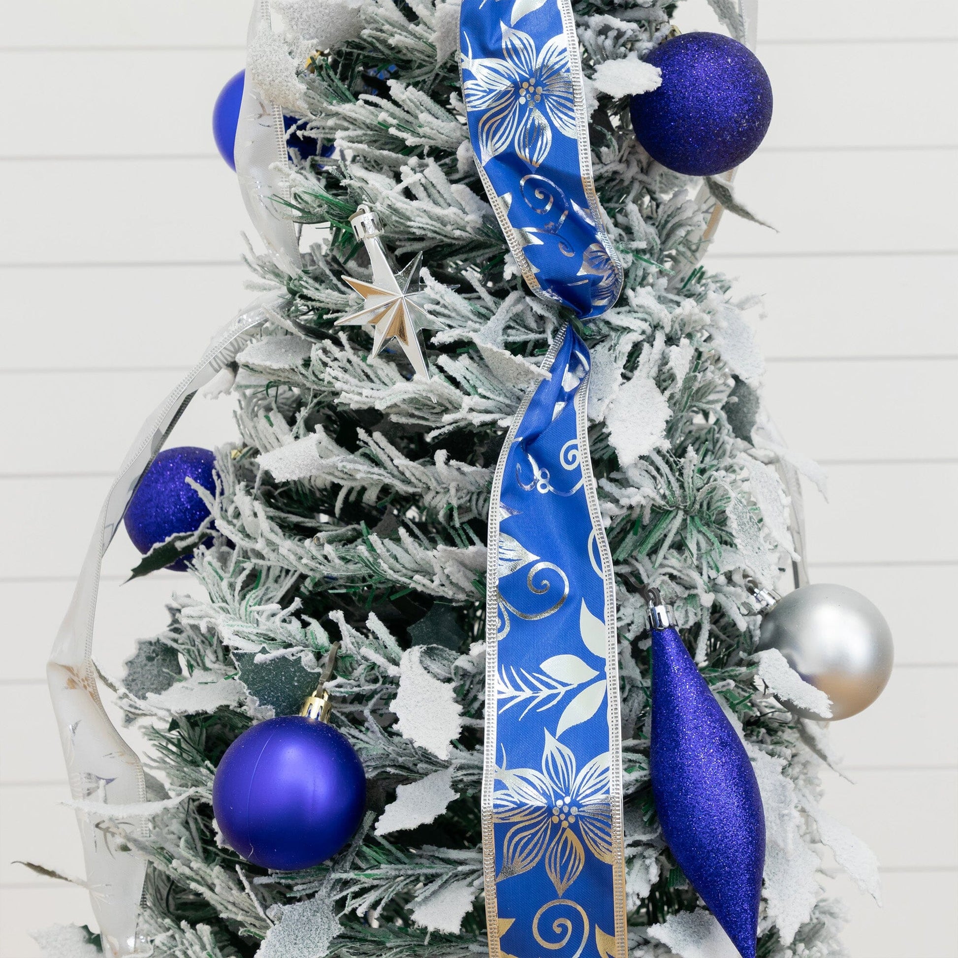 5' pre-lit artificial pop-up flocked Christmas tree with blue ornaments and silver ribbons on Tampa Home & Garden Store