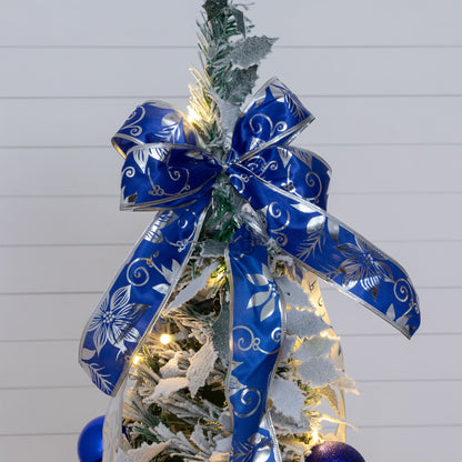 5' pre-lit flocked Christmas tree with blue ribbon and blue ornaments, white LED lights on Tampa Home & Garden Store