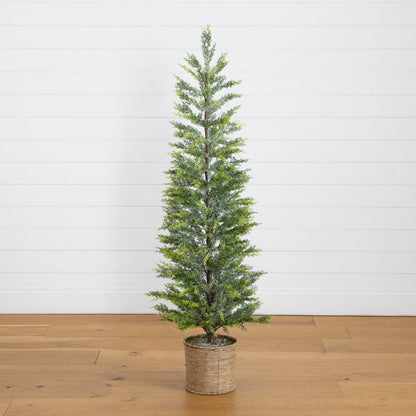 5ft pre-lit snowed cypress Christmas tree in a hyacinth basket green foliage on Tampa Home & Garden Store