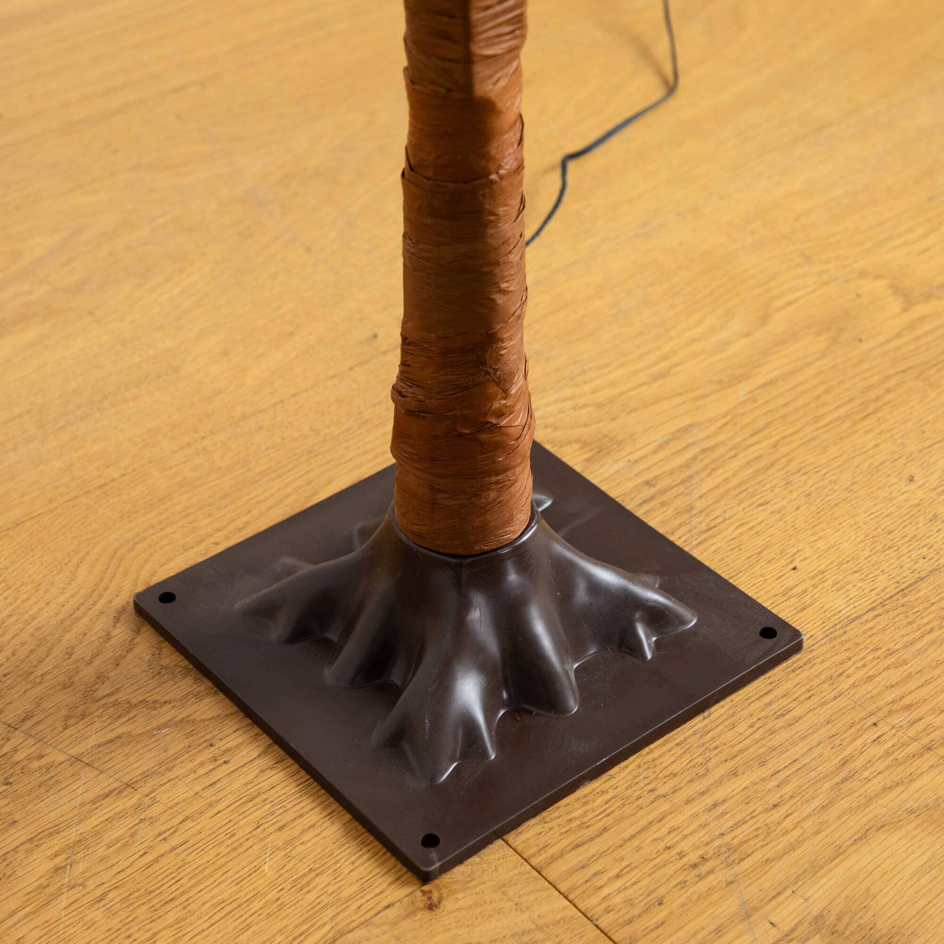 5 ft pre-lit autumn weeping maple tree trunk wrapped in brown bark on a black square base on Tampa Home & Garden Store