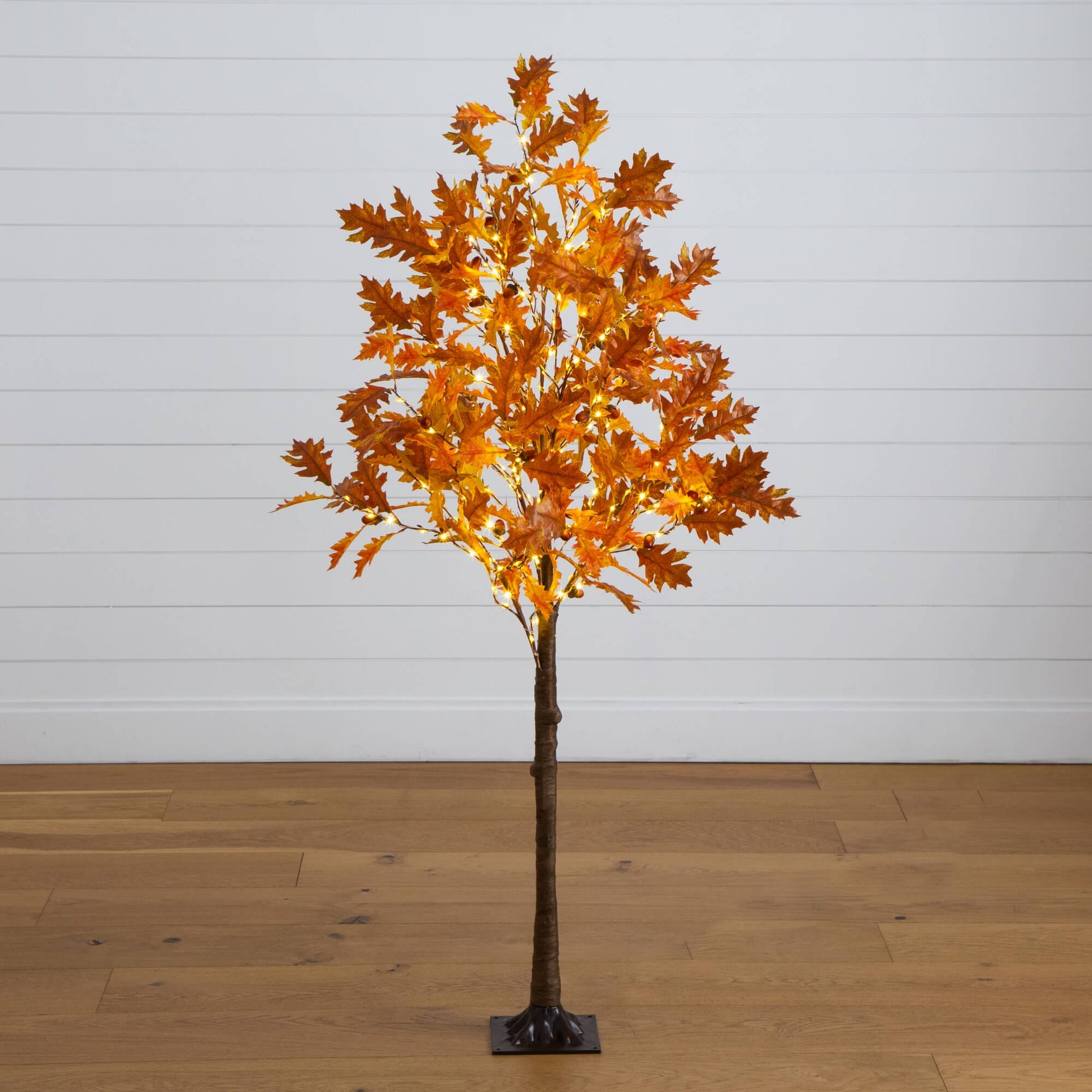 5 ft pre-lit burnt orange autumn maple artificial tree with 240 warm white LEDs and a black square base on Tampa Home & Garden Store