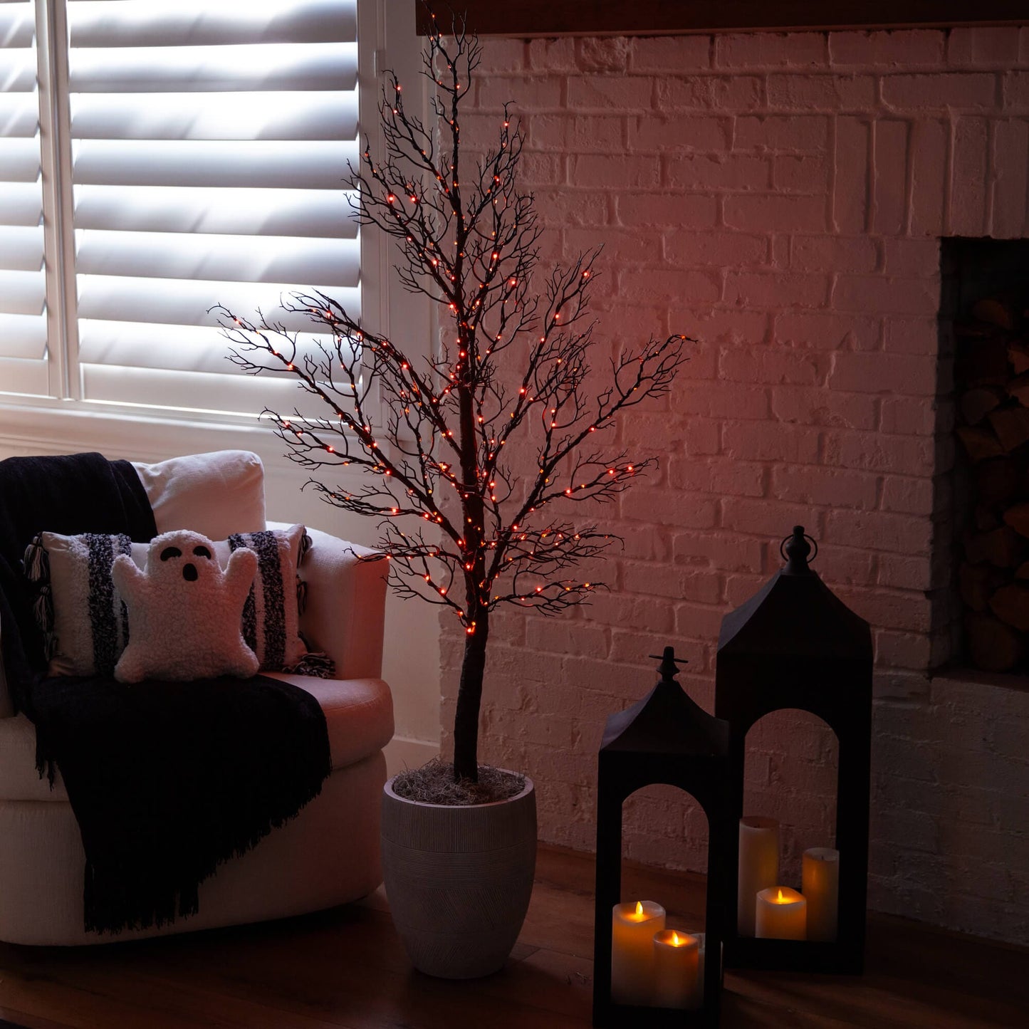 5' Pre-Lit Halloween Minimalist Twig Tree with 240 orange and purple LEDs in a gray pot on Tampa Home & Garden Store