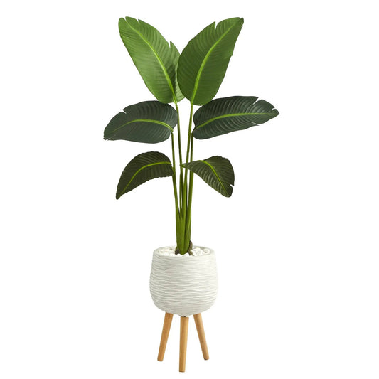 Traveler's Palm artificial plant with green leaves in white planter on wooden tripod stand on Tampa Home & Garden Store