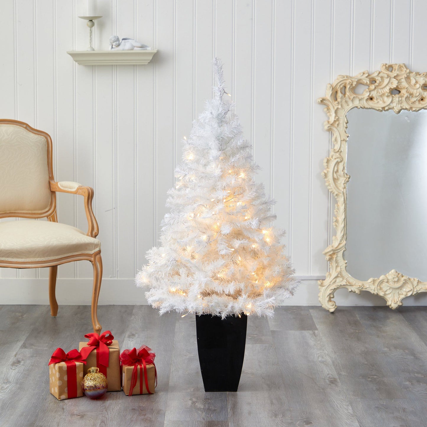50in Nearly Natural white artificial Christmas tree with 100 LED lights in a black planter on Tampa Home & Garden Store