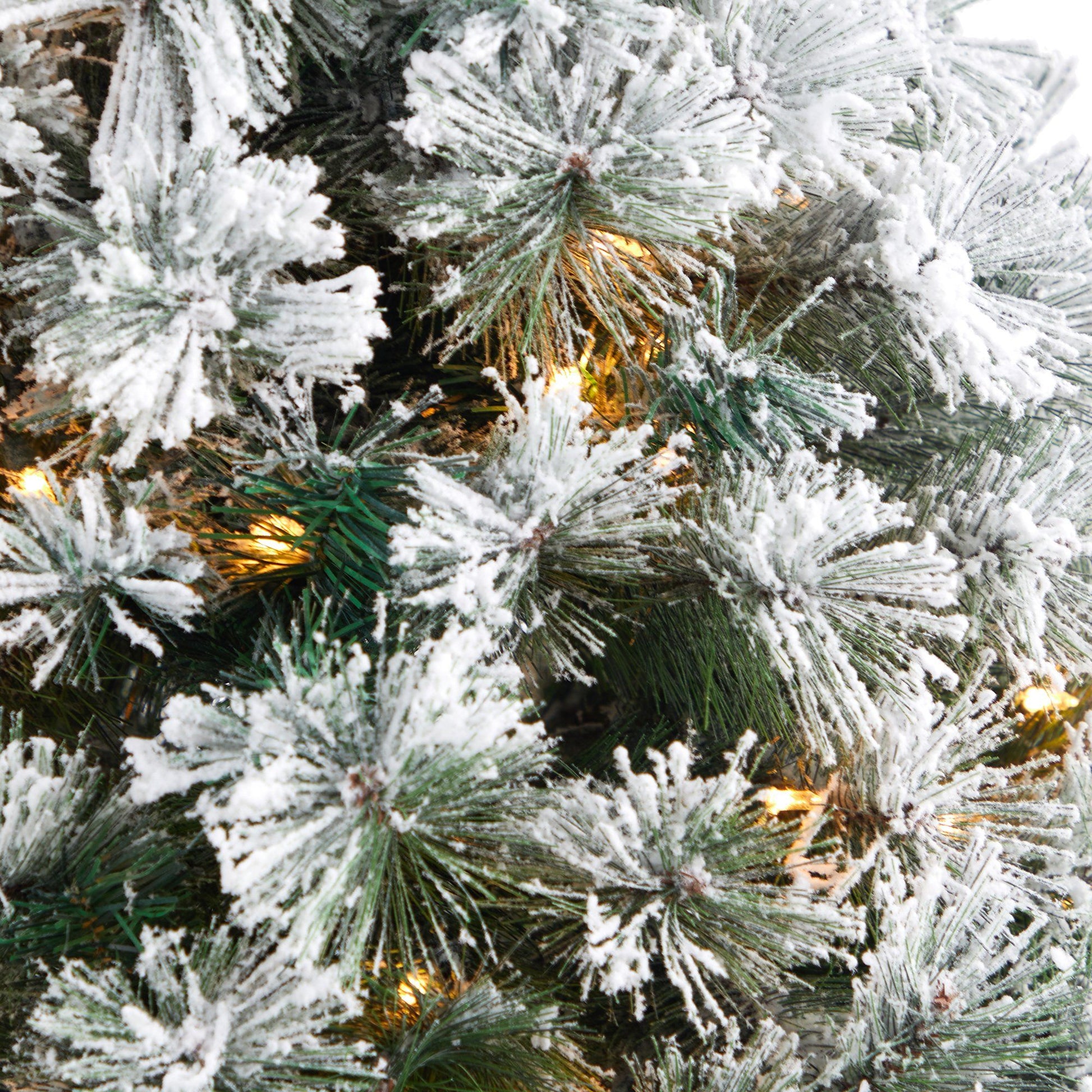 56in flocked Oregon Pine artificial Christmas tree with 100 clear lights, 215 bendable branches on Tampa Home & Garden Store