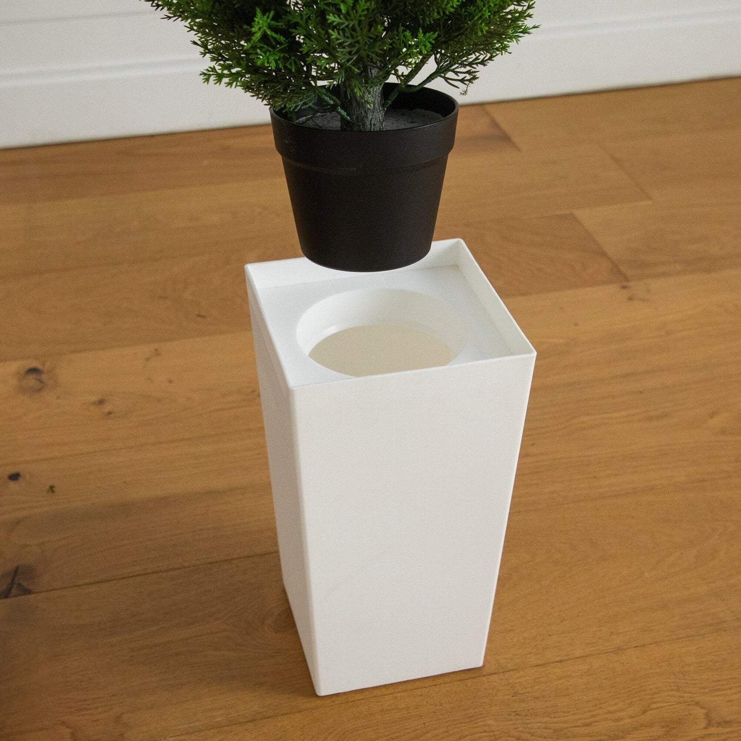 56in UV resistant artificial cedar tree in a black cylindrical planter on Tampa Home & Garden Store