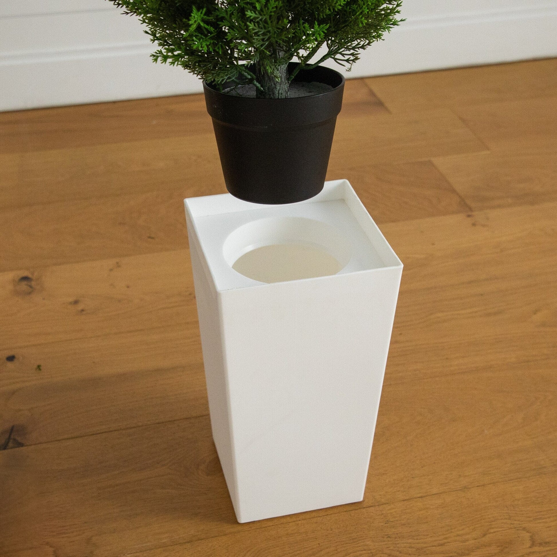 56in UV resistant artificial cedar tree in a black cylindrical planter on Tampa Home & Garden Store