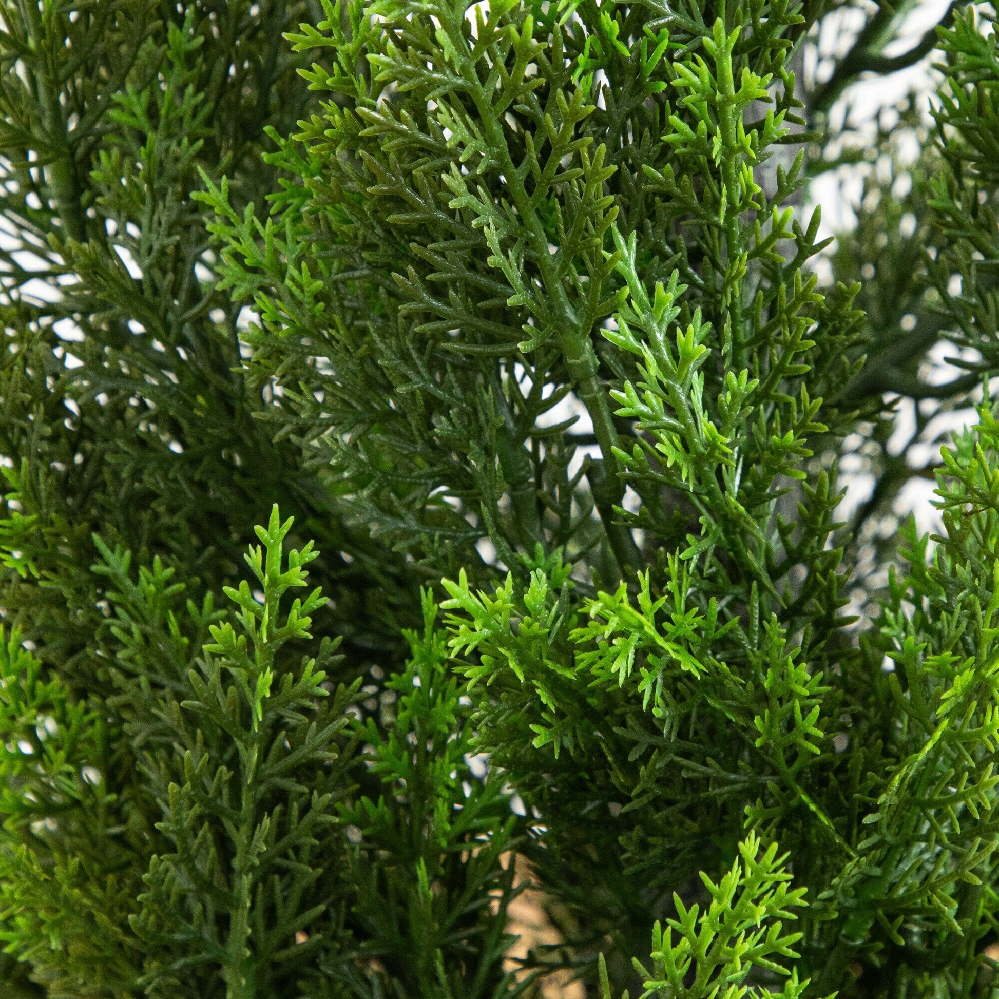Artificial cedar tree foliage close-up with dense green UV resistant branches by Nearly Natural on Tampa Home & Garden Store