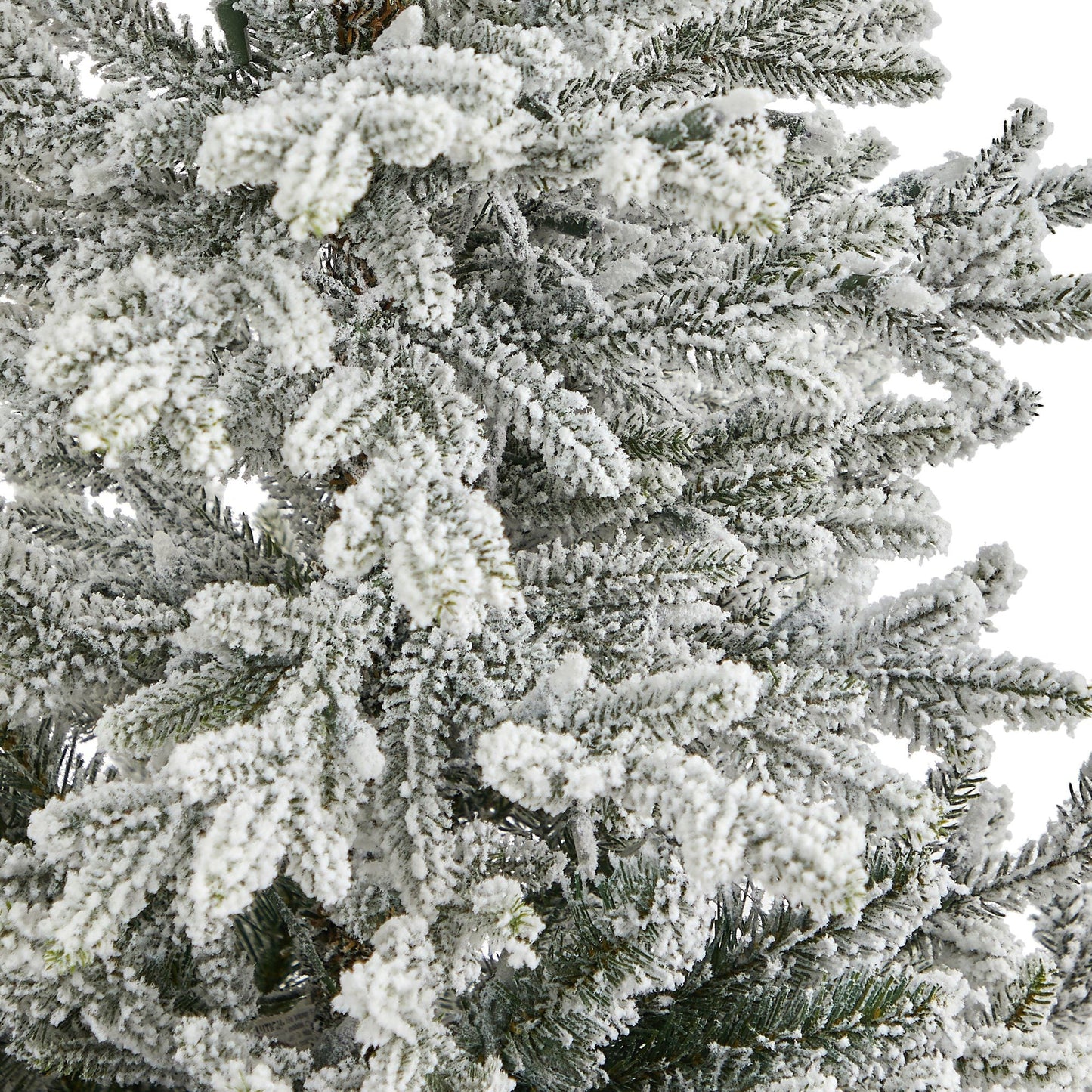Nearly Natural Christmas tree with flocked Fraser Fir branches dusted with snow on Tampa Home & Garden Store