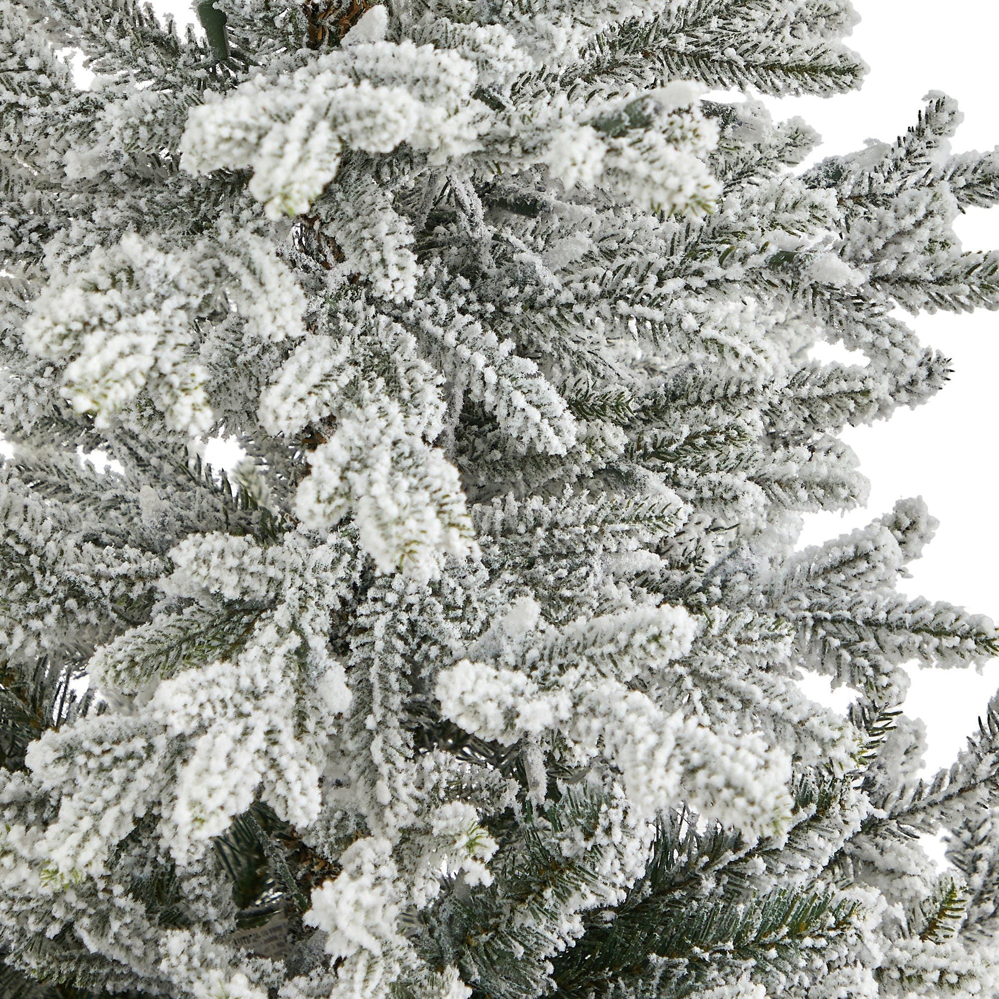 Nearly Natural Christmas tree with flocked Fraser Fir branches dusted with snow on Tampa Home & Garden Store