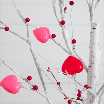 5 ft white-washed twig tree with pink heart-shaped LED lights and red berries on Tampa Home & Garden Store
