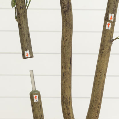 Artificial olive tree with brown bark trunks, three stems and small green leaves; display stickers on limbs on Tampa Home & Garden Store