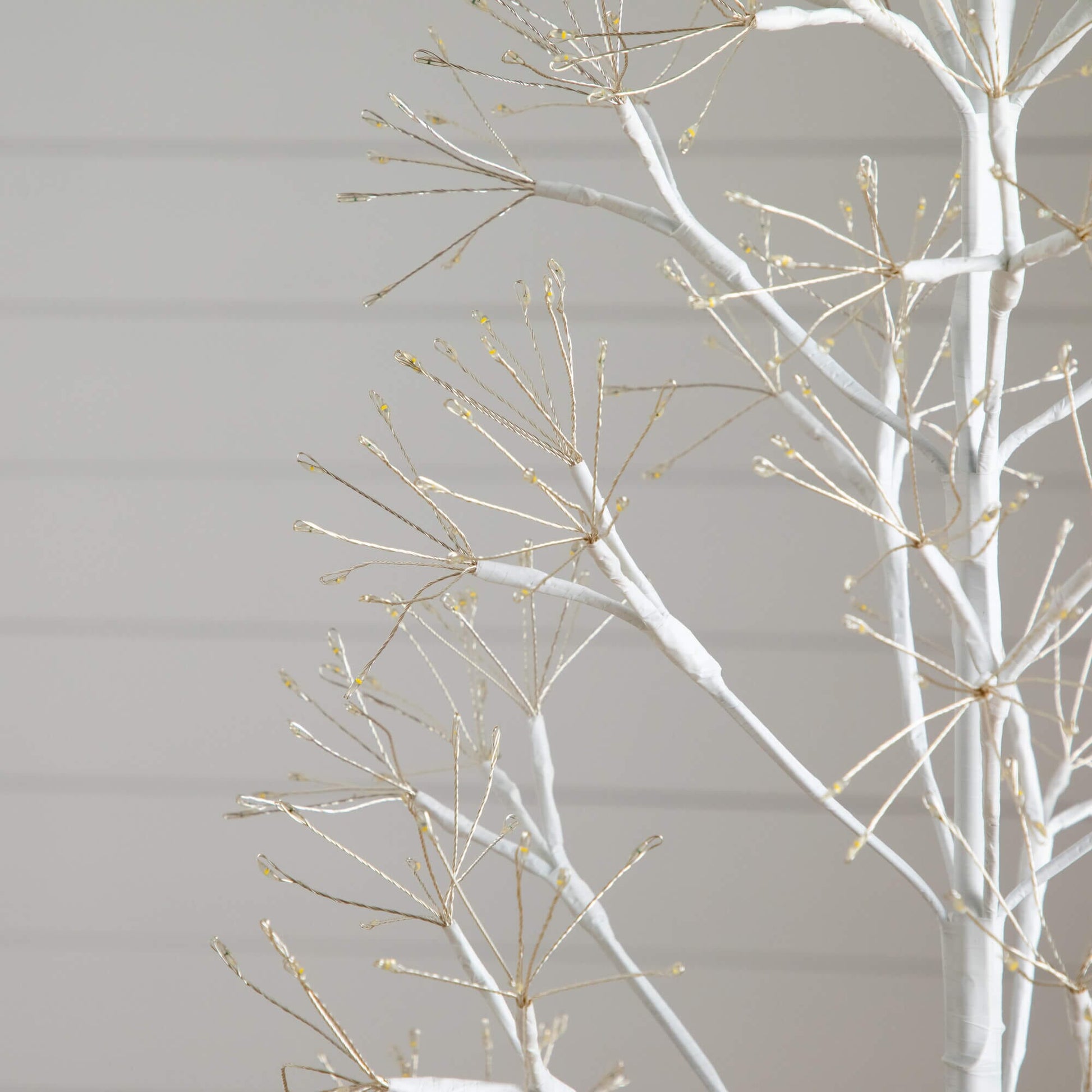 6 ft white starburst artificial Christmas tree branches with warm LED lights from Nearly Natural on Tampa Home & Garden Store