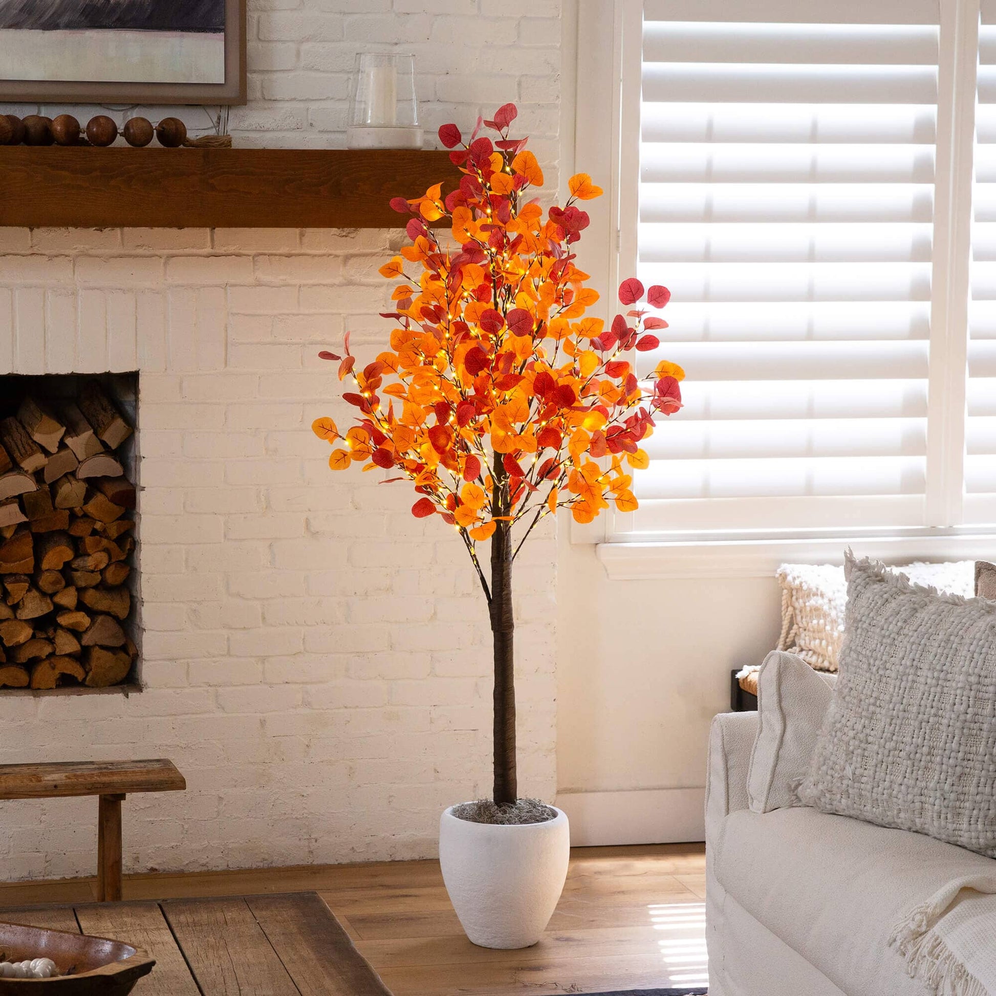 6 ft Nearly Natural autumn eucalyptus artificial tree with orange leaves and 420 warm white LEDs in white planter on Tampa Home & Garden Store
