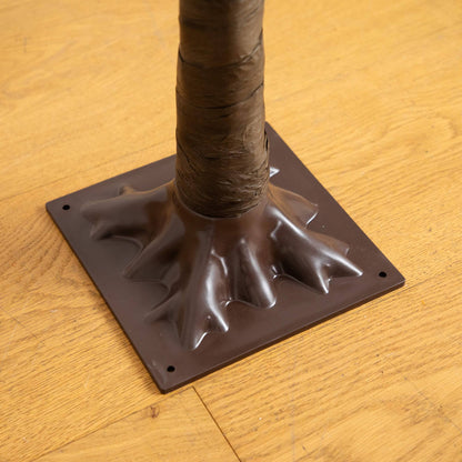 6' Pre-Lit Bright Autumn Eucalyptus Tree trunk close-up with brown wrap on dark base plate on Tampa Home & Garden Store