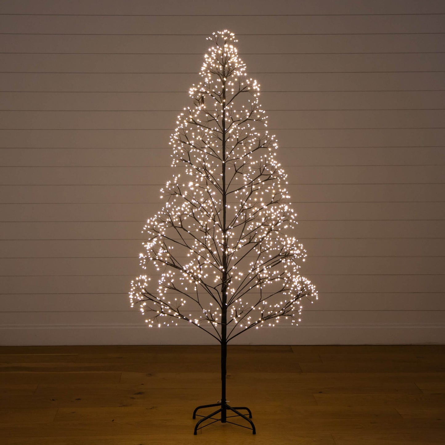 6-ft Pre-Lit Artificial Halloween Black Starburst Tree with 1680 warm white LED lights on Tampa Home & Garden Store