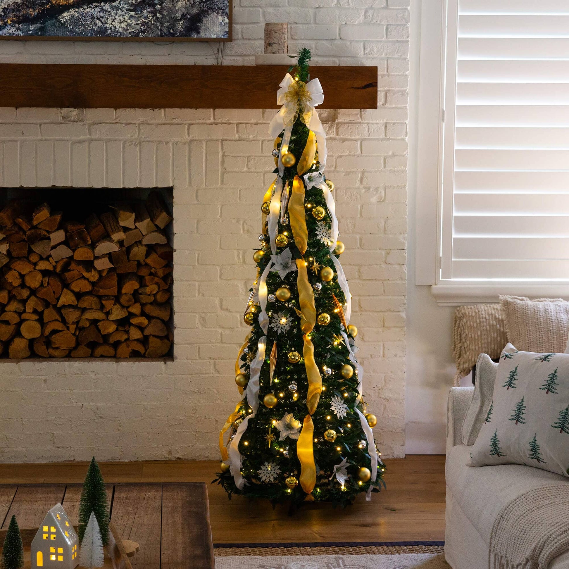 6 ft pre-lit artificial pop-up Christmas tree with gold and silver ornaments and ribbons on Tampa Home & Garden Store
