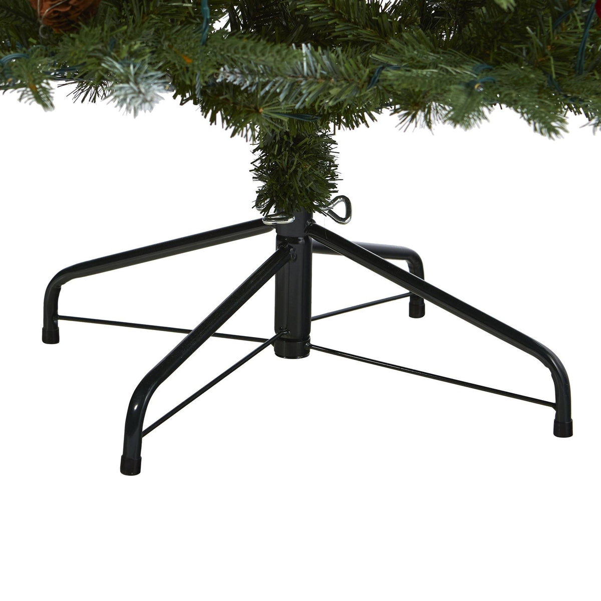 6 ft Portland Spruce artificial Christmas tree with snow-tipped needles on a black metal stand on Tampa Home & Garden Store
